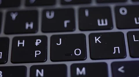Computer keyboard details background. Action. Close up top view of white letters Foto stock