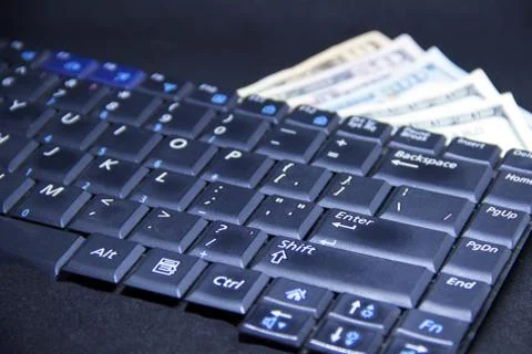Computer keyboard with dollars and card Stock Photos