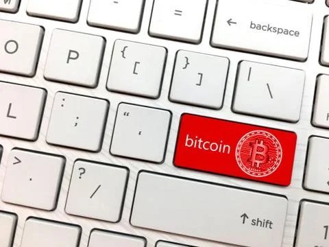 Computer keyboard enter button with bitcoin and bitcoin symbol 스톡 사진