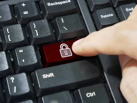 Computer keyboard enter button with Security system and padlock symbol Stock Photos