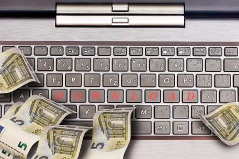 Computer keyboard with euro notes Stock Photos
