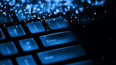 Computer keyboard with Fiber optics background, shot in HD Stock Footage 65824050