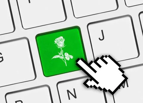 Computer keyboard with flower key Computer keyboard with flower key - tech... Stock Photos