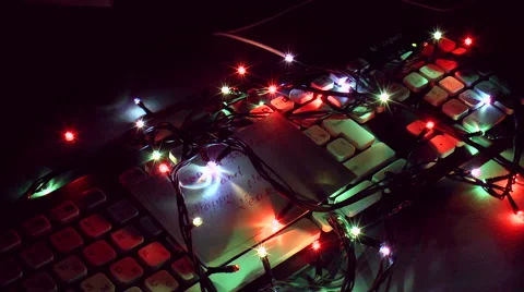 Computer keyboard with garlands Stock Footage 44025558
