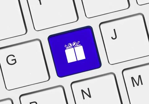 Computer keyboard with gift key Computer keyboard with gift key - business... Stock-Fotos