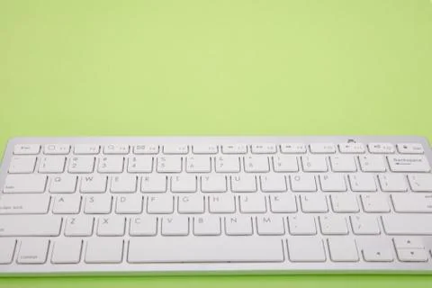 Computer keyboard on green background Stock-Fotos