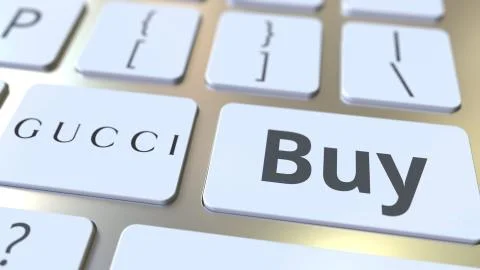 Computer keyboard with GUCCI logo and Buy text on the keys. Editorial 3D Stock Illustration