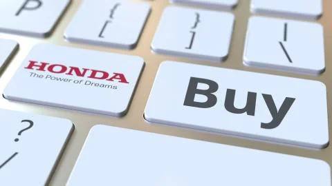 Computer keyboard with HONDA logo and Buy text on the keys. Editorial 3D Stock Illustration