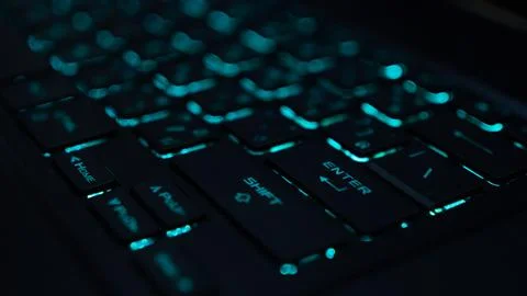 A computer keyboard is an input device that allows a person to enter letter.. Stock Photos