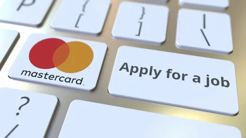 Computer keyboard with MASTERCARD logo and Apply for a job text on the keys Vídeos de archivo 103863449