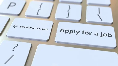 Computer keyboard with MITSUI logo and Apply for a job text on the keys Stock Footage 103877267
