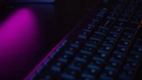 Computer keyboard in neon light Stock Footage