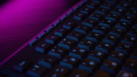 Computer keyboard in neon light Stock Footage 132607659