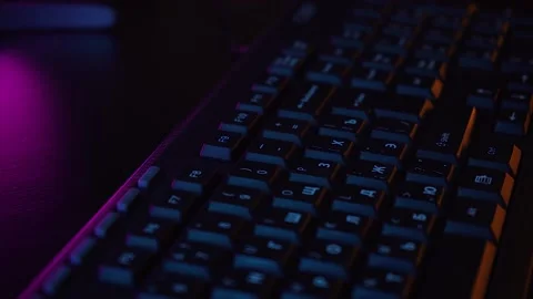 Computer keyboard in neon light Stock Footage 132607671
