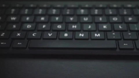 Computer Keyboard - push into focus Stock Footage 103904038