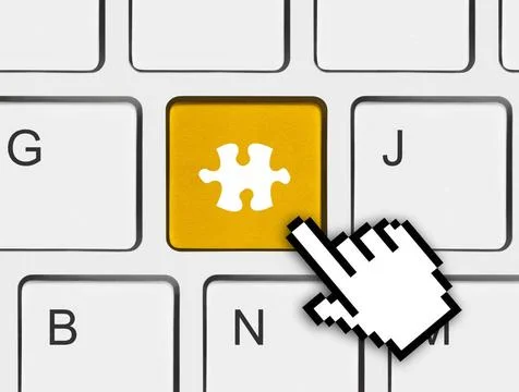 Computer keyboard with puzzle key Computer keyboard with puzzle key - busi... Stock Photos