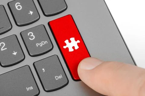 Computer keyboard with puzzle key Stock Photos