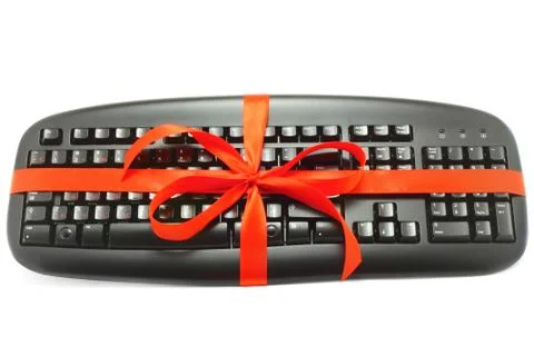 Computer keyboard with red bow Stock Photos