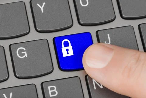 Computer keyboard with security key Stock Photos