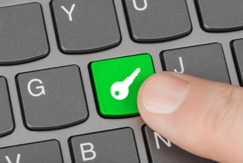 Computer keyboard with security key Stock Photos