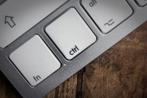 Computer keyboard - silver keyboard of a laptop with button CTRL isolated. Ho Stock Photos