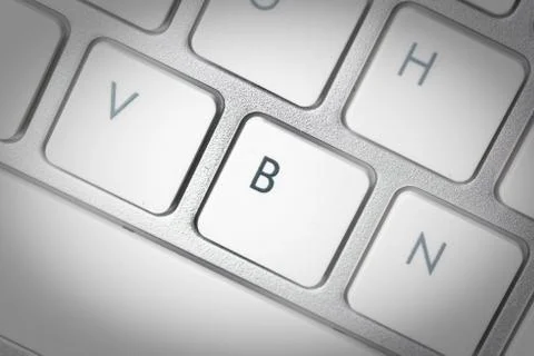 Computer keyboard - silver keyboard of a laptop with button B isolated. Home  Stock Photos