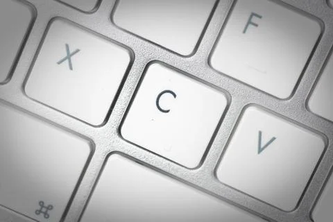 Computer keyboard - silver keyboard of a laptop with button C isolated. Home  Foto stock