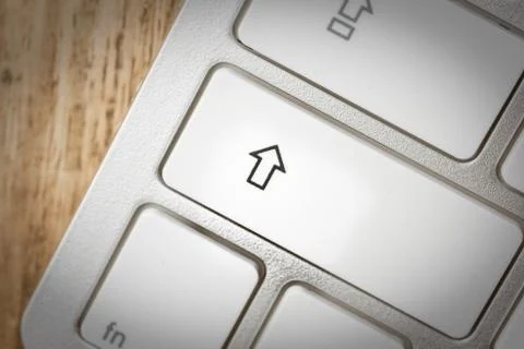 Computer keyboard - silver keyboard of a laptop with button SHIFT isolated. H Stock Photos