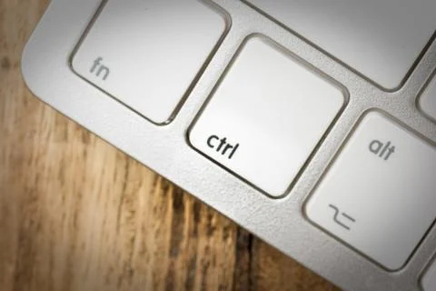 Computer keyboard - silver keyboard of a laptop with button CTRL isolated. Ho Stock Photos