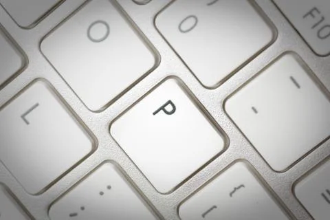 Computer keyboard - silver keyboard of a laptop with button P isolated. Home  Stock Photos