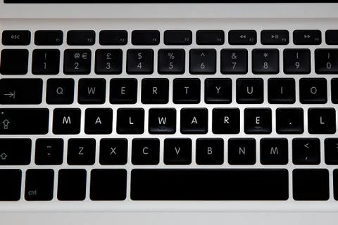 Computer keyboard spelling malware Stock Photos