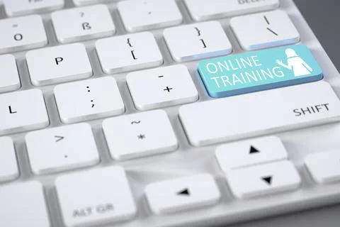 A computer keyboard with the symbol online training Stock Photos