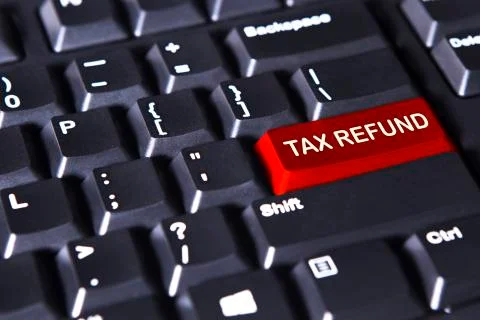 Computer keyboard with text of tax refund Stock Photos