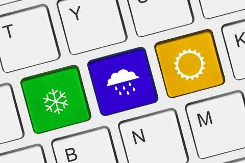 Computer keyboard with Weather key Computer keyboard with Weather key - te... Stock Photos