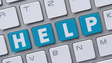 A  computer keyboard with the word Help Stock Photos