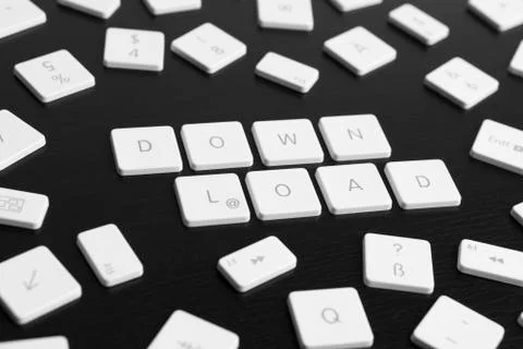 Computer keys spelling the words DOWN LOAD 스톡 사진