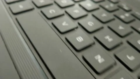 Computer keys in a top view in a camera movement on bright room 스톡 동영상 167076120
