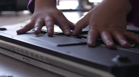 A Computer Kid romoving a battery Stock Footage 57451081