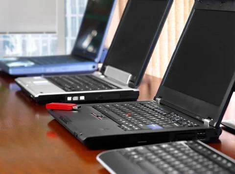 Computer Lab Computer classroom. Row of laptops in training room Copyright... Stock Photos