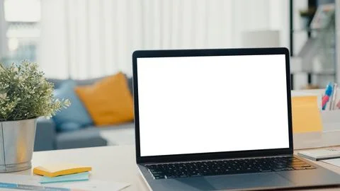 Computer laptop with blank white screen mock up display for advertising tex.. Stock Photos