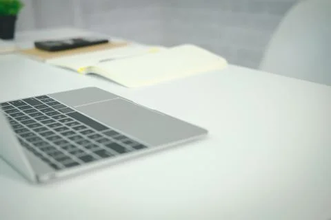 Computer laptop calculator notebook on office desk. Stock-Fotos