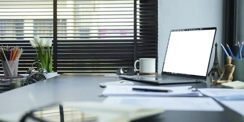 Computer laptop, digital tablet, calculator, financial document and coffee cu Stock Photos