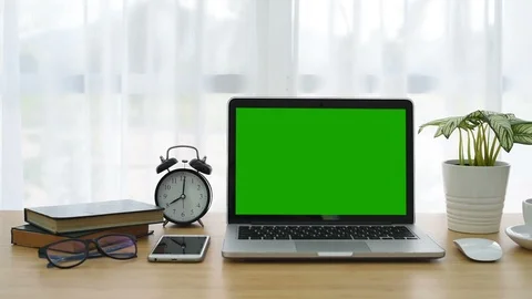 Computer Laptop with green screen display. Dolly in. Perfect to put your own ima Stock Footage 87447421