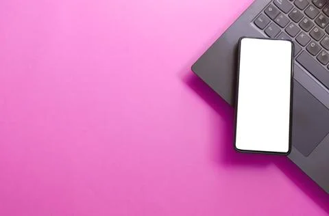 Computer, laptop, smartphone isolated screen on pink background workspace Stock Photos