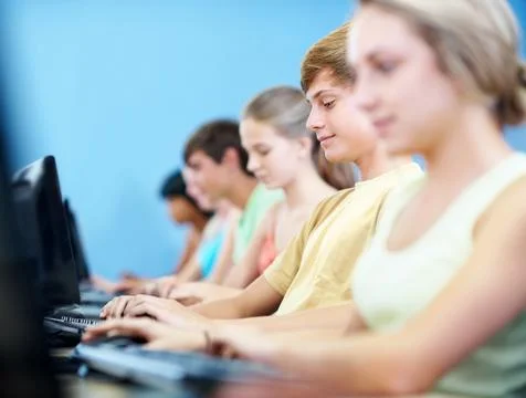 Computer, learning and typing with students in classroom for education, lec.. 写真素材