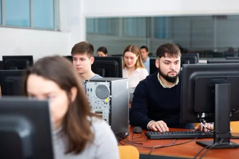 Computer lessons for adults in classroom Foto stock