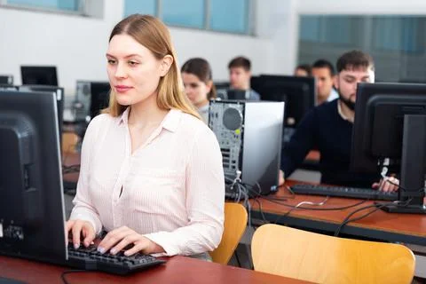 Computer lessons for adults in classroom Foto stock