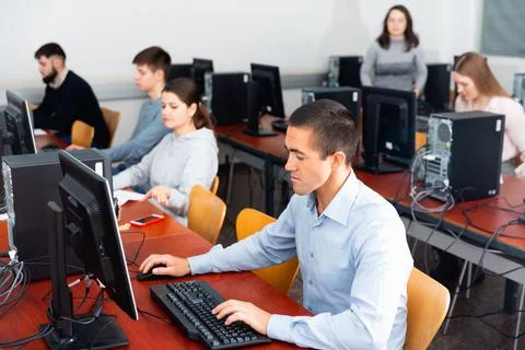 Computer lessons for adults in classroom Foto stock