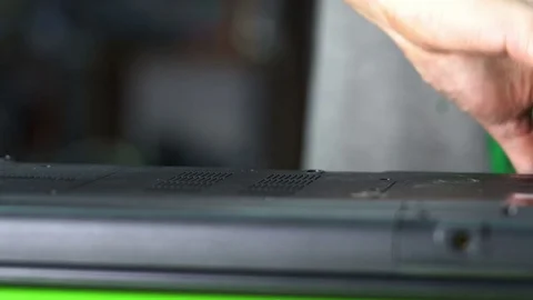 Computer literacy repair men hands, man examines laptop Stock Footage 71248468