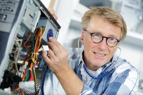 A computer maintenance worker concept Stock Photos